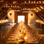 Une table élégamment dressée dans un cadre sophistiqué, idéale pour une célébration de mariage de luxe en Provence. Ce lieu exceptionnel, avec son ambiance romantique, est parfait pour un grand événement sur mesure. Les chandeliers et les bougies créent une atmosphère chaleureuse, idéale pour un grand mariage ou une cérémonie unique dans un domaine privé. Avec l'expertise de By Mademoiselle C, chaque détail est soigneusement organisé pour réaliser le rêve d'un mariage inoubliable