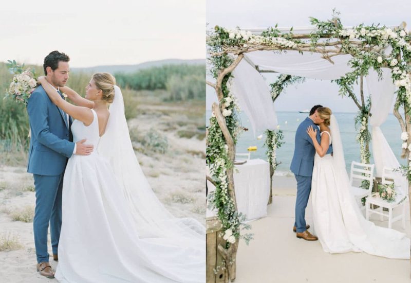 Un couple romantique s'embrassant sous une élégante arche de fleurs, symbolisant un mariage de luxe en Provence, Côte d'Azur et Corse. Cette scène capture l'essence d'une cérémonie grandiose, entourée par la beauté naturelle d'une plage sereine. Le cadre idyllique, avec des touches de sophistication et de romantisme, illustre parfaitement une organisation sur mesure pour un événement unique. Chaque détail reflète l'expertise de By Mademoiselle C dans la