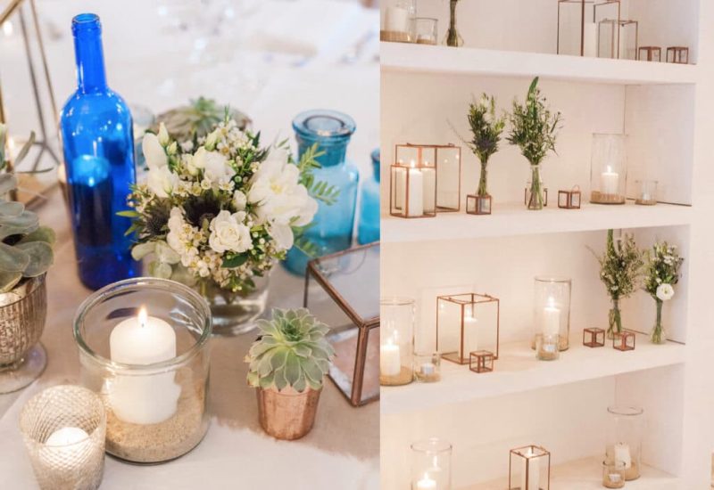 Un élégant arrangement floral avec des bougies scintillantes et des bouteilles colorées, créant une atmosphère romantique pour un mariage de luxe. Ce décor sophistiqué illustre l'expertise de By Mademoiselle C dans l'organisation de cérémonies sur mesure en Provence, Côte d'Azur et Corse. Chaque détail est soigneusement pensé pour un événement unique, offrant un cadre idyllique dans un domaine privé ou un jardin pittoresque. Ce mariage sur mesure promet une célébration