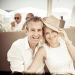 Un couple rayonnant partage un moment de complicité dans un cadre élégant, parfait pour un mariage romantique en Provence, Côte d'Azur et Corse. Ce moment capturé évoque l'atmosphère d'une célébration grandiose, idéale pour une organisation sur mesure orchestrée par By Mademoiselle C. Les couples en quête d'une expérience de mariage unique seront séduits par les lieux exceptionnels et les domaines privés qui font la renommée de cette marque de luxe. Que ce